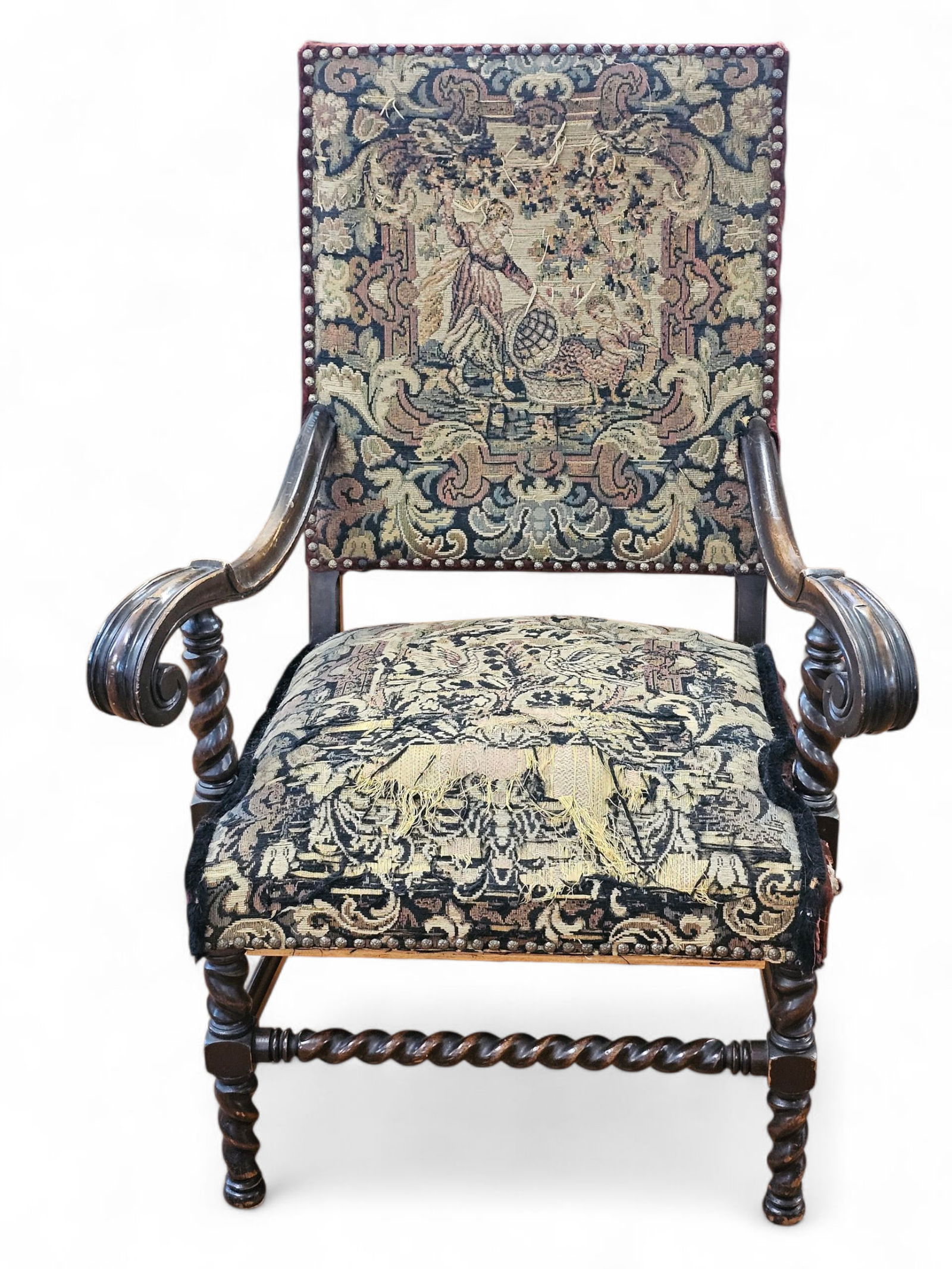 Antique 19th C. Carved English Mahogany Upholstered Armchair: The chair is in overall good antique condition, with a fine upholstered needlepoint seat and seatback. The frame is finely carved mahogany, appearing to date to the 19th century. See lot photos for mo