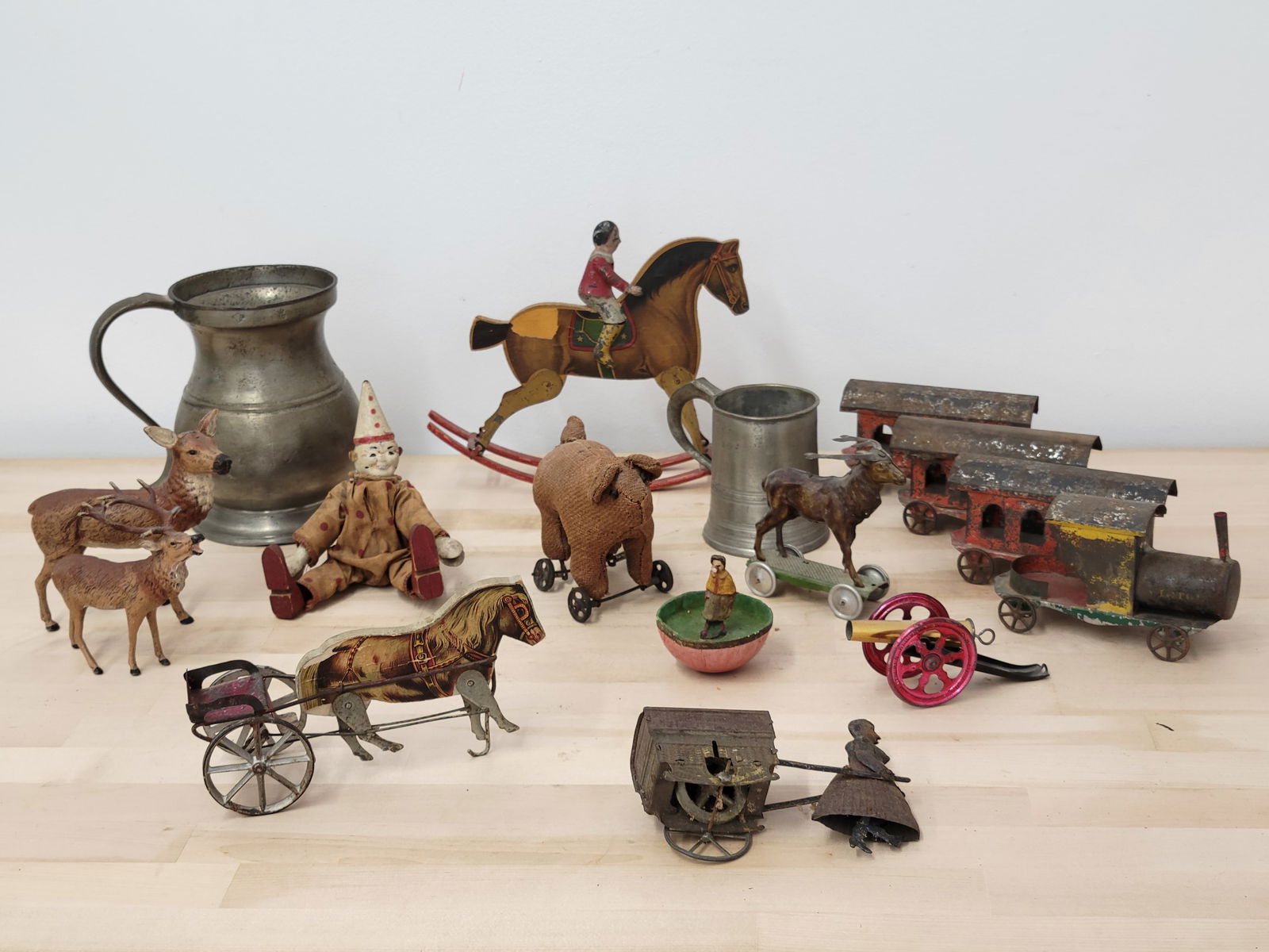 Collection of Early Antique Childs Toys, Pull Toys, Trains and more!: This lot includes a small grouping of vintage and antique toys, many primitive pieces. From pull toys to trains, you get all that you see in the photos. Offered in estate found condition, see lot phot