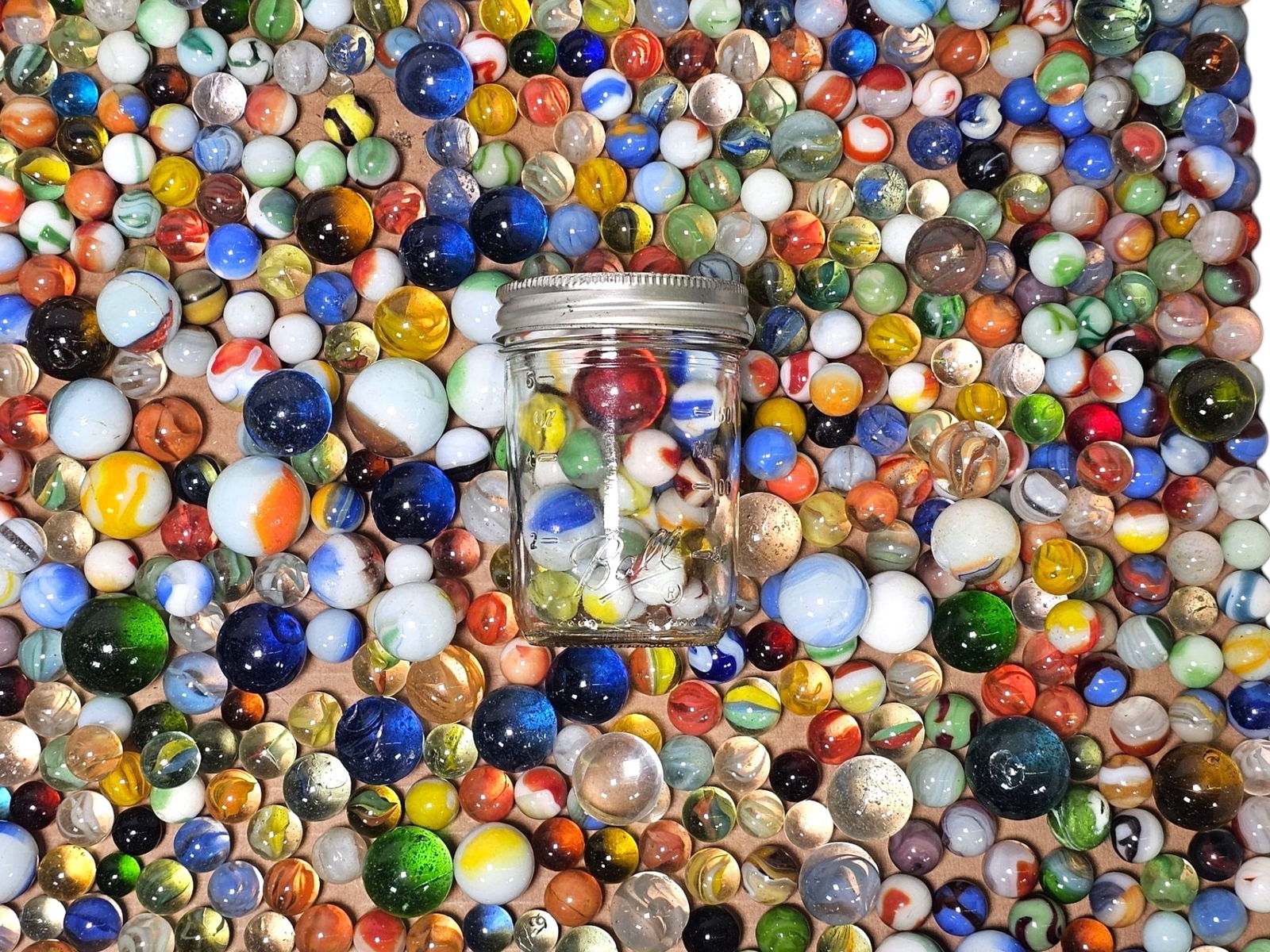 Large Estate Found Lot of Marbles - Vintage to Antique: This lot includes a large grouping of assorted marbles offered as found in the estate. Some appear vintage others antique, some may be modern. You get everything you see in the photos, so be sure to r