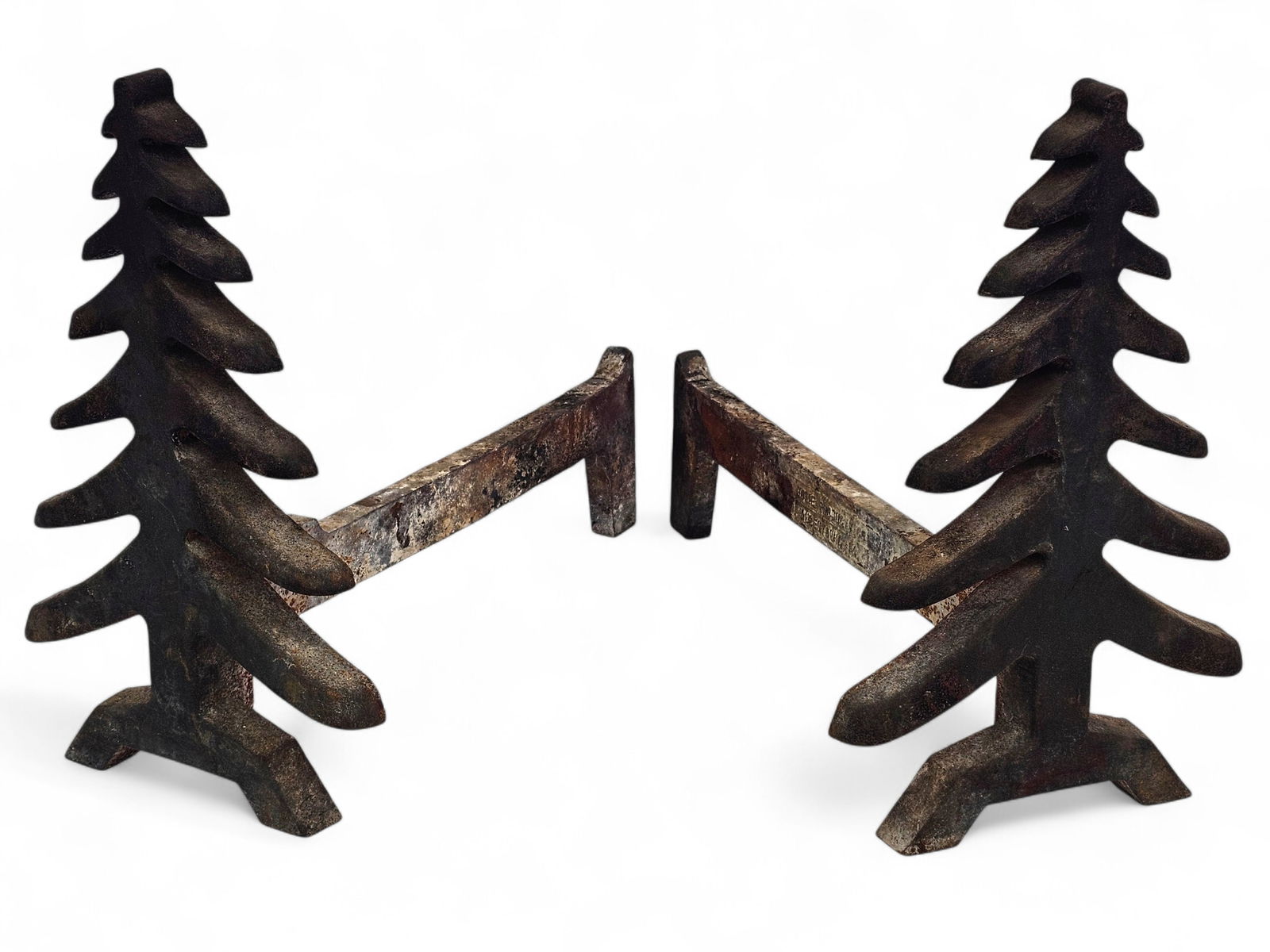 Pair of Folk Art Pine Tree Cast Metal Andirons: These tree form andirons are made of cast metal and shaped like fir trees. Wear consistent with age and use including oxidation and buildup/encrustation. See photos for more item and condition details
