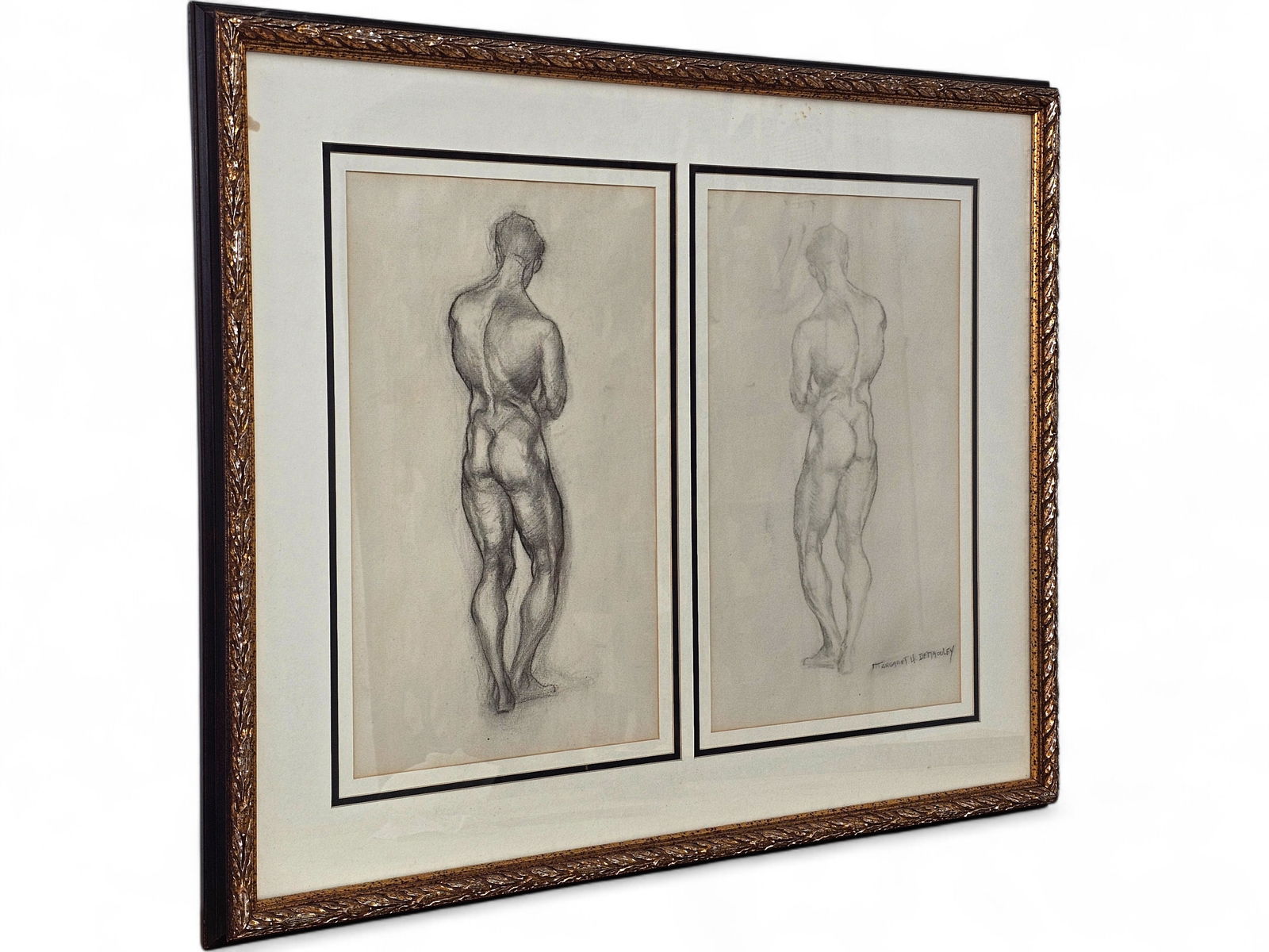 Margaret Denaouley, Charcoal Drawing of Nude Figure: This work is a diptych with a charcoal drawing of a nude figure and a transfer monoprint of the drawing. Signed lower right and framed in gilt frame and matted behind glass. Wear consistent with age i