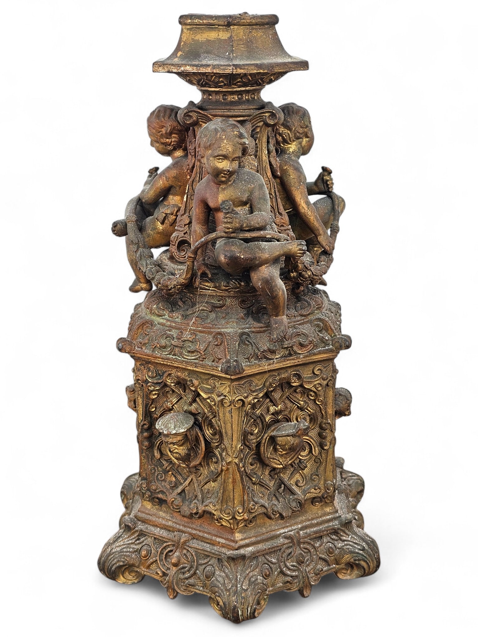 Antique Victorian Style Cast Metal Architectural Salvage Sculpture: Antique Victorian style cast metal sculptural piece that features cherub figures seated atop an ornately decorated base. The piece is likely architectural salvage and is solid and relatively heavy. We