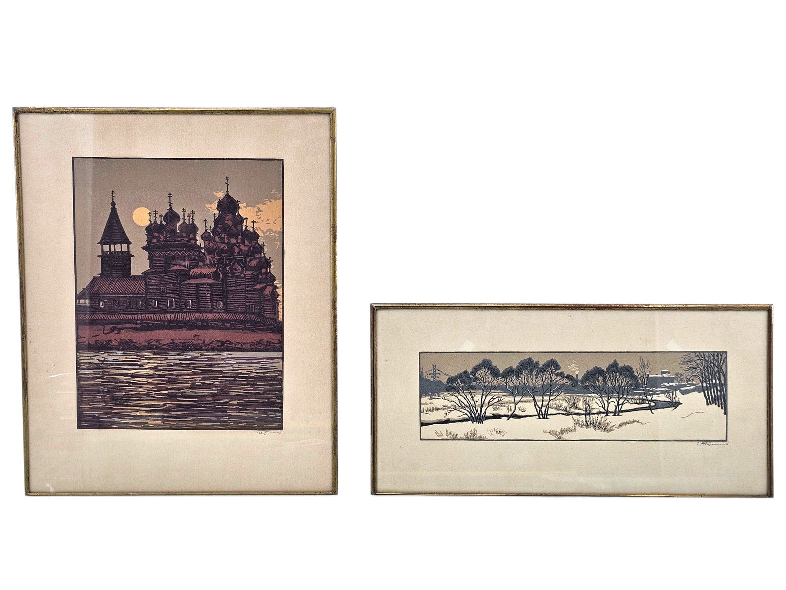 Pair of Signed Soviet Era Color Block Print Landscapes: Pair of colored block prints Depicting landscape scenes, one a forested winter landscape, and the other with onion domed buildings. Both have applied label verso written in Russian which read "RSFSR"