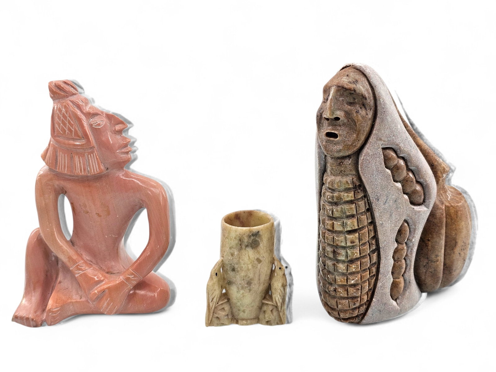 Grouping of 3 Native American Hand Carved Stone Figures: Grouping of 3 Native American hand carved hardstone figurines, one of them a corn maiden figure carved from multiple types of stone. Two are signed with illegible writing on base and the other is unma