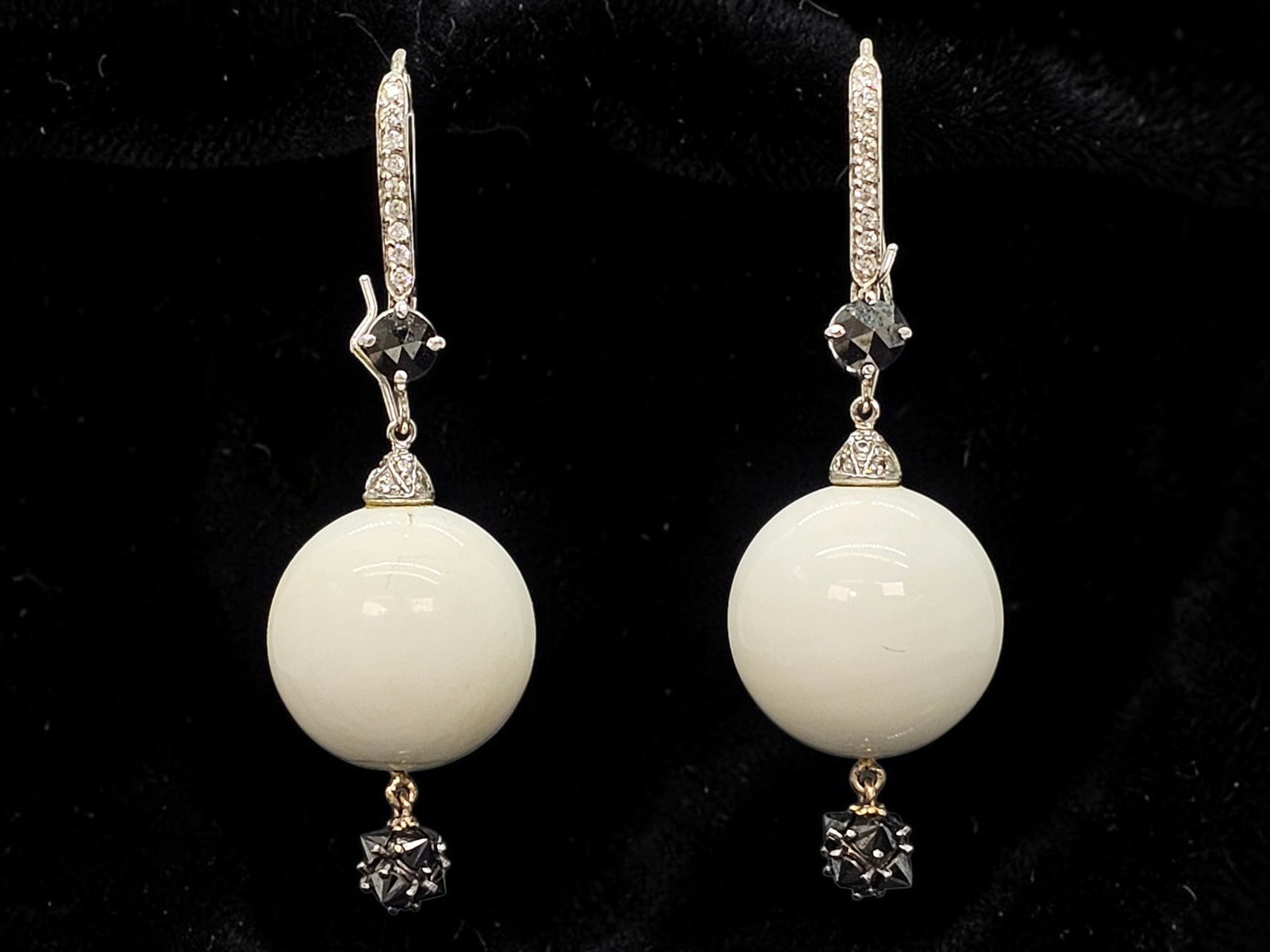 "Paolo Costagli" 18K White Gold Diamond, Marcasite & Polished White Stone Earrings: Details: The earrings showcase a large polished white stone bead at the base, with cut Diamonds and marcasite stones throughout. All set into 18K white gold. Marked on the reverse. 