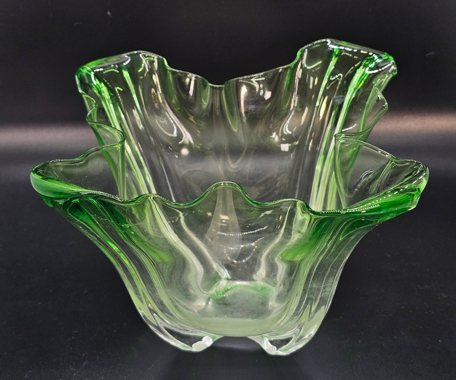 Steuben Grotesque Bowl, Green To Clear - Signed: Steuben "Grostesque" art glass center bowl. This hankerchief bowl features green to clear glass and a ruffled edge. Acid etched Steuben signature has faded/rubbed off quite a bit but is still visible.