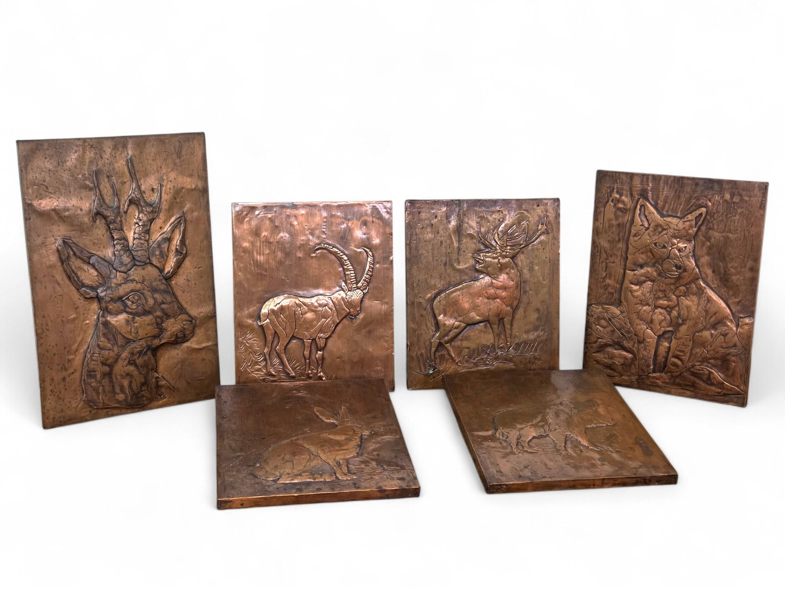 (5pc) Vintage Mid-Century Embossed Copper Relief Pictures of African Animals: Each pictures a different animal, in various sizes and styles. See lot photos for more details on the contents and conditions of this lot. Largest picture measures 12.75"L x 8.5"W 