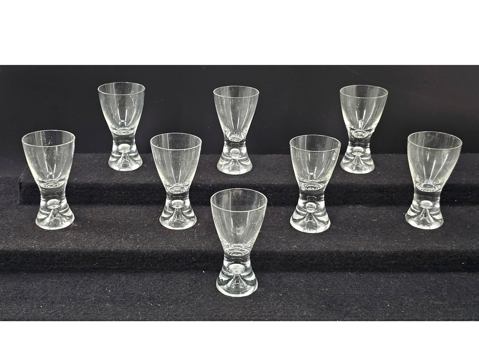 Set 8 Bubble Shot Glasses by Tapio Wirkkala for Iittala Finland - 3.25"T: This lot includes a set of 12 vintage Mid-20th century bubble shot glasses designed by Tapio Wirkkala for Iittala in Finland. The set has been in storage in the original boxes since the 1970s! The gla