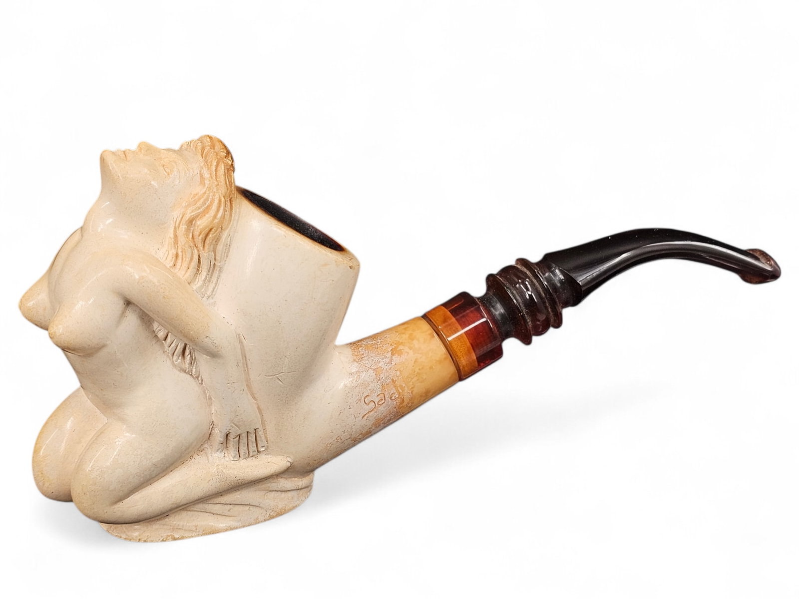 Meerschaum Carved Figural Pipe w/ Nude Woman: Vintage carved meerschaum pipe of a nude woman. Word "Sadik" is carved in meerschaum near mouthpiece. Wear consistent with age and use including discoloration and surface wear. See photos for more ite