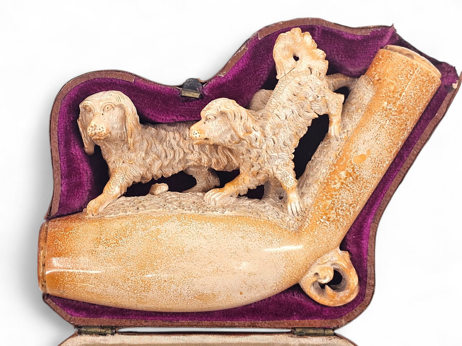 Antique Meerschaum Carved Dogs Pipe Head: Carved meerschaum tobacco smoking pipe with two dogs. Pipe is in a case and does not have a stem/mouthpiece. Wear consistent with age and use including discoloration and surface wear. See photos for m