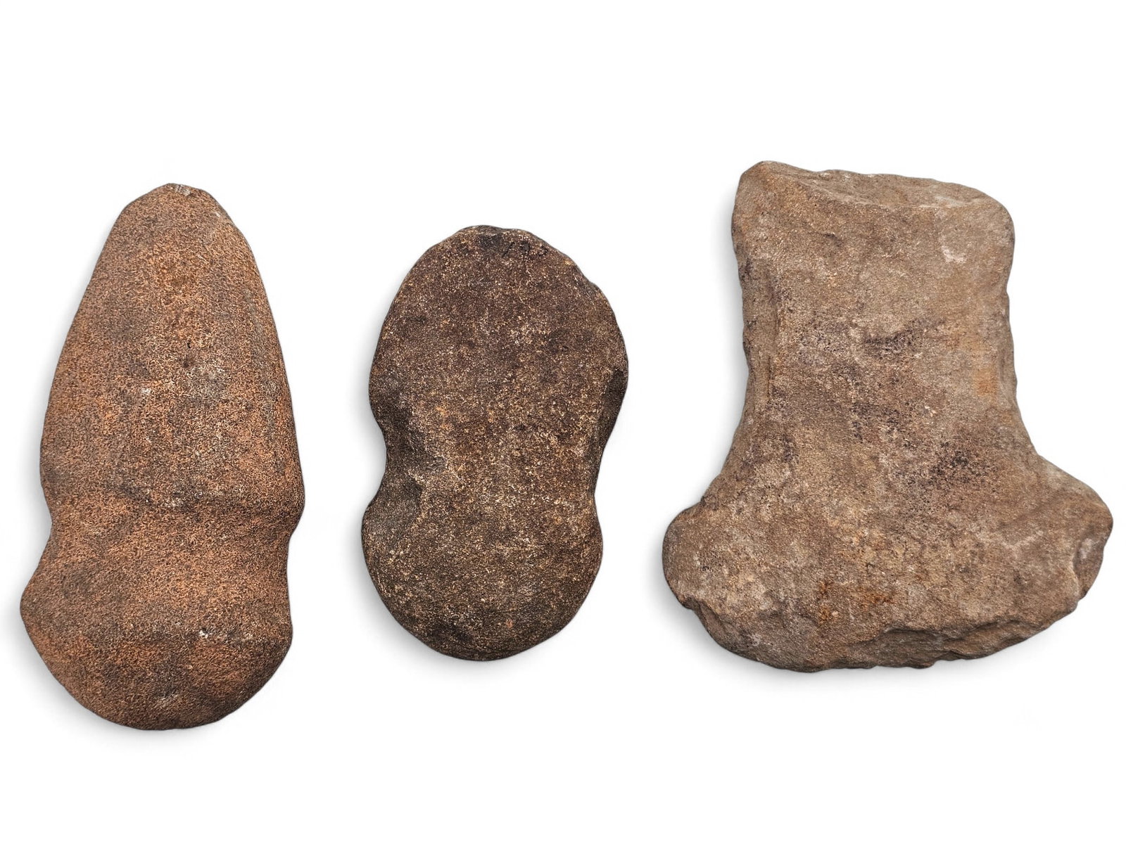 (3pc) Lot of Native American Full Groove Stone Axe Heads: This lot features Native American artifacts from a large, privately held collection spanning pieces attributed to the prehistoric era through more modern periods. All items are offered exactly as show