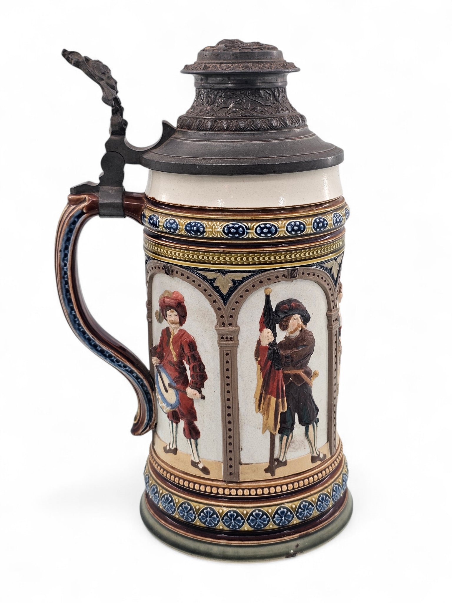 Mettlach German Beer Stein #1809 - Cavaliers & Barmaid: Mettlach Cavaliers & Barmaid #1809 stoneware ceramic beer stein. With intricate decorated pewter lid. Impressed marks on base including Metllach makers mark & more. Wear consistent with age and use in