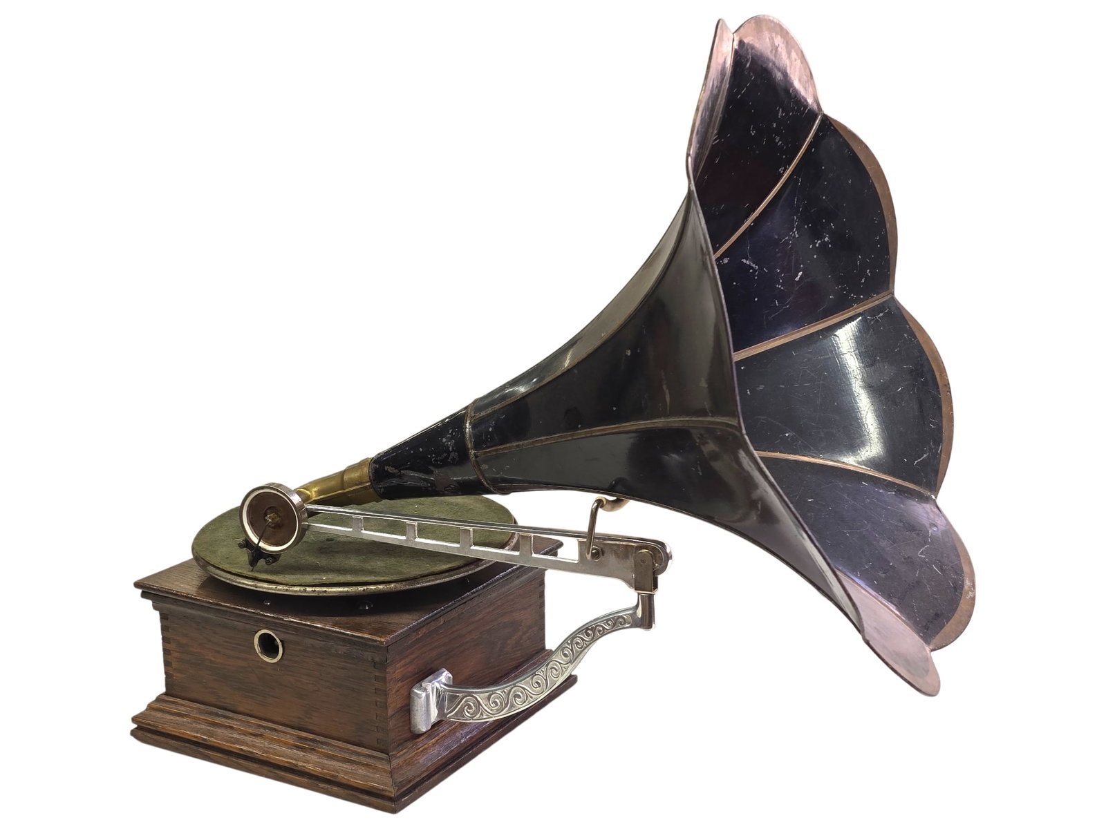 Antique Victor Style Front Mount Horn Disk Phonograph: Antique cylinder phonograph offered directly from a private collector’s estate. The machine retains its original horn and is unmarked as to manufacturer. The motor runs,