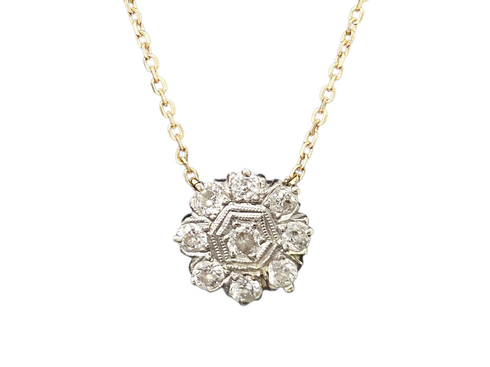14K Yellow Gold & Diamond Floral Style Necklace: Details: The necklace features a mounted floral style pendant, inset with 9 cut diamonds. Material: 14K Yellow GoldBrand/Designer: Unknown / Unmarked Condition: In good overal