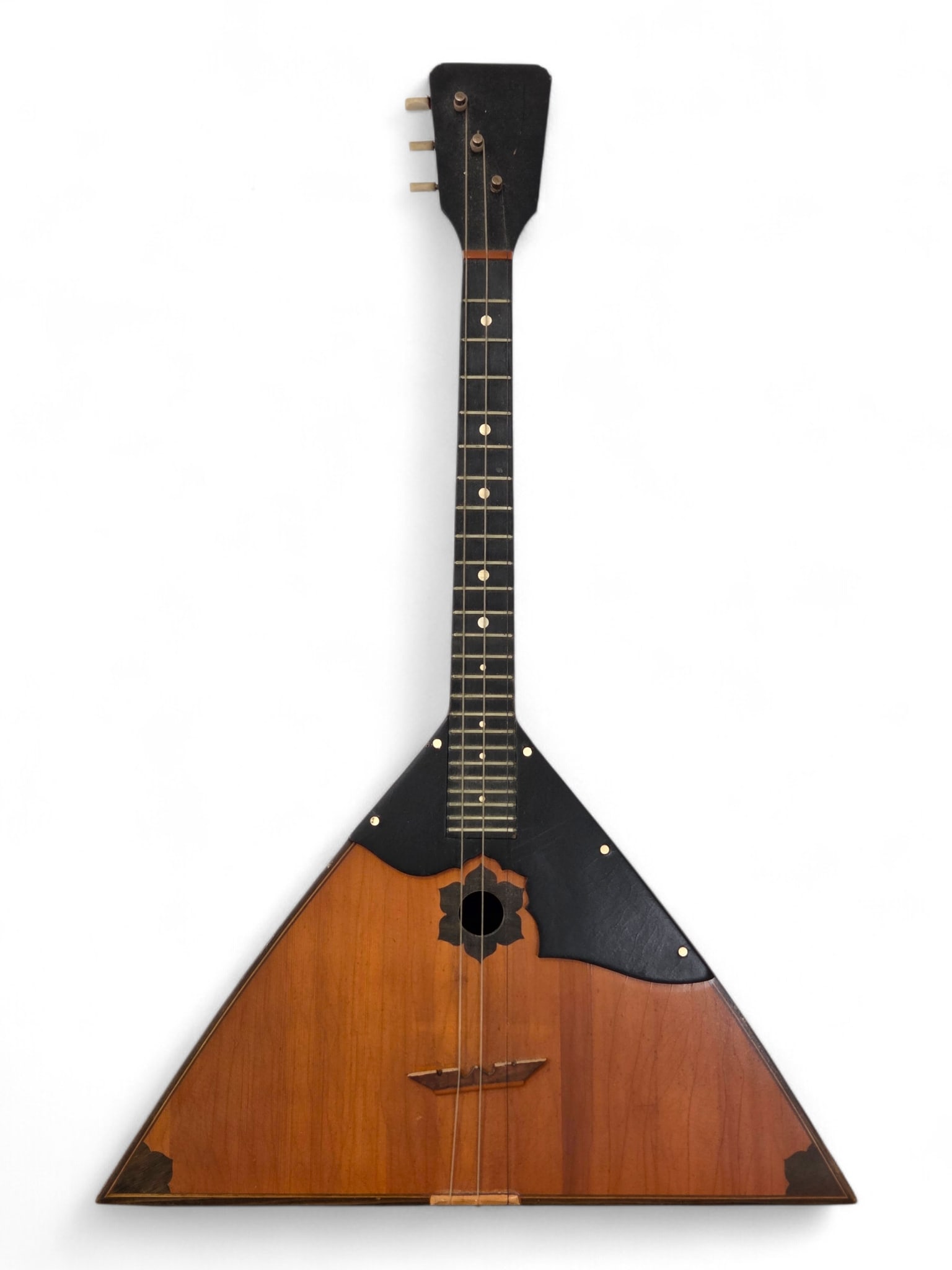 Soviet Balalaika with Moscow Skyline: 20th C. Russian Balalaika guitar with a painted view of city on verso. Plaque with Russian writing on the back of the headstock. Crazing to varnish and surface wear. Strings likely need to be replaced