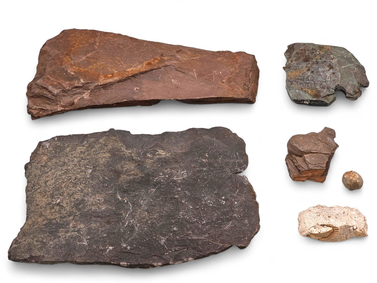 Grouping of Native American Stone Artifacts / Tools: This lot features Native American artifacts from a large, privately held collection spanning pieces attributed to the prehistoric era through more modern periods. All items are offered exactly as show