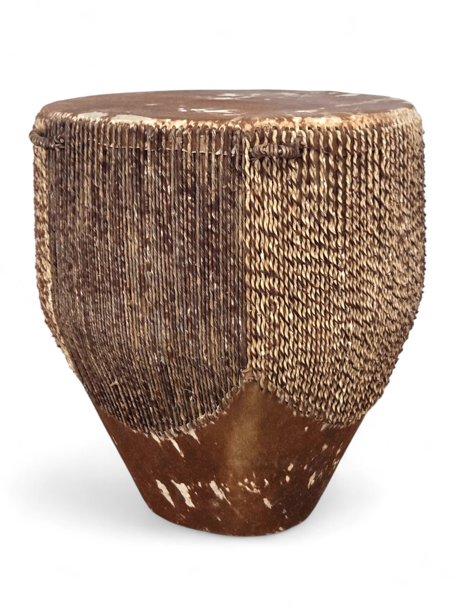 African Tribal Cowhide Drum:  African cow hide covered carved wood drum. The drum is tapered toward base and has twisted hide tie decorations. Age appropriate wear consistent with age and use. See photos for more item and c