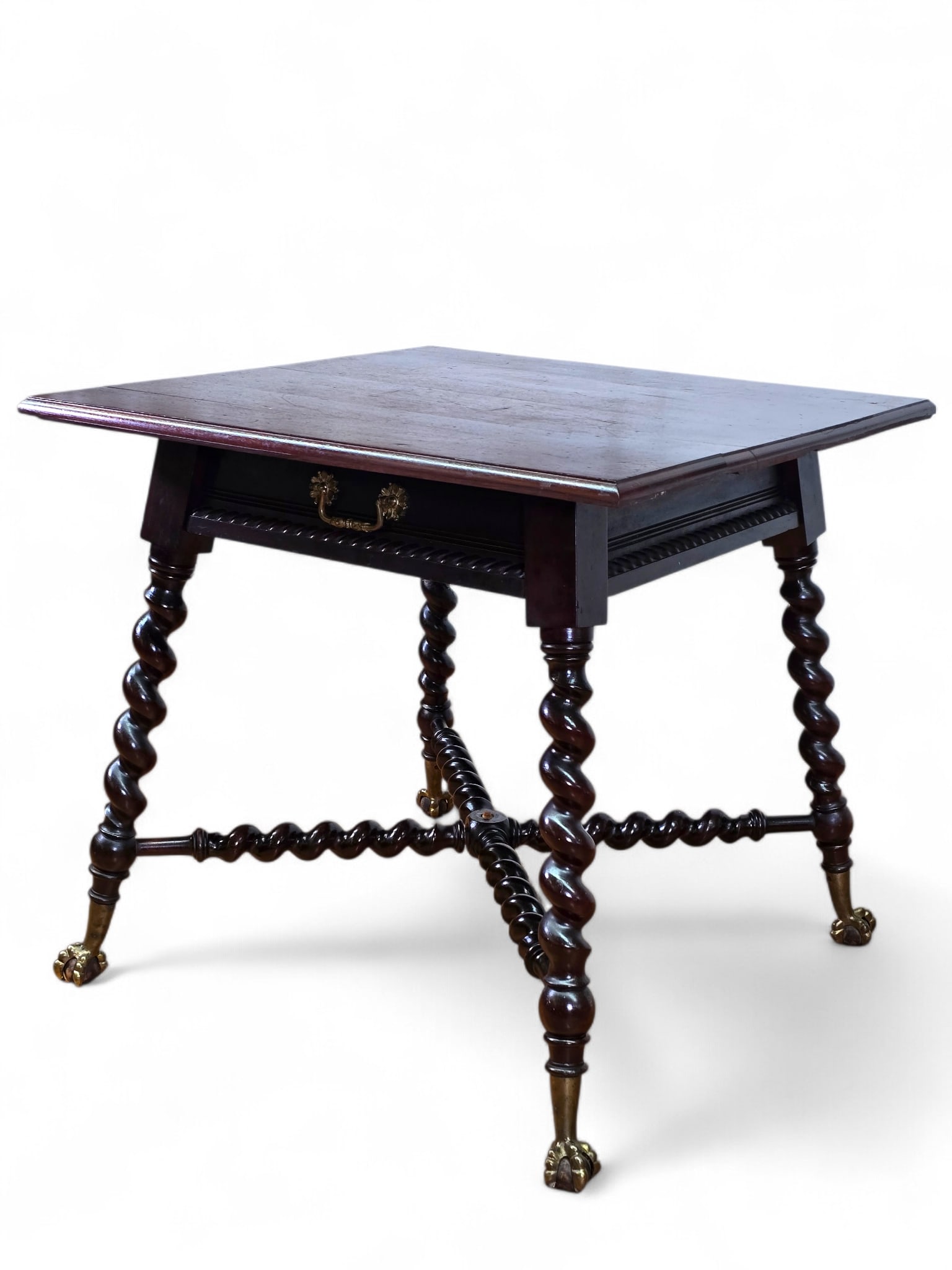 19th C. Spanish Style Carved Walnut Table:  19th C. Spanish style table with square top and carved apron. On carved solomonic legs and stretcher with cast metal brass bird foot shape feet. Wear consistent with age and use including surfa
