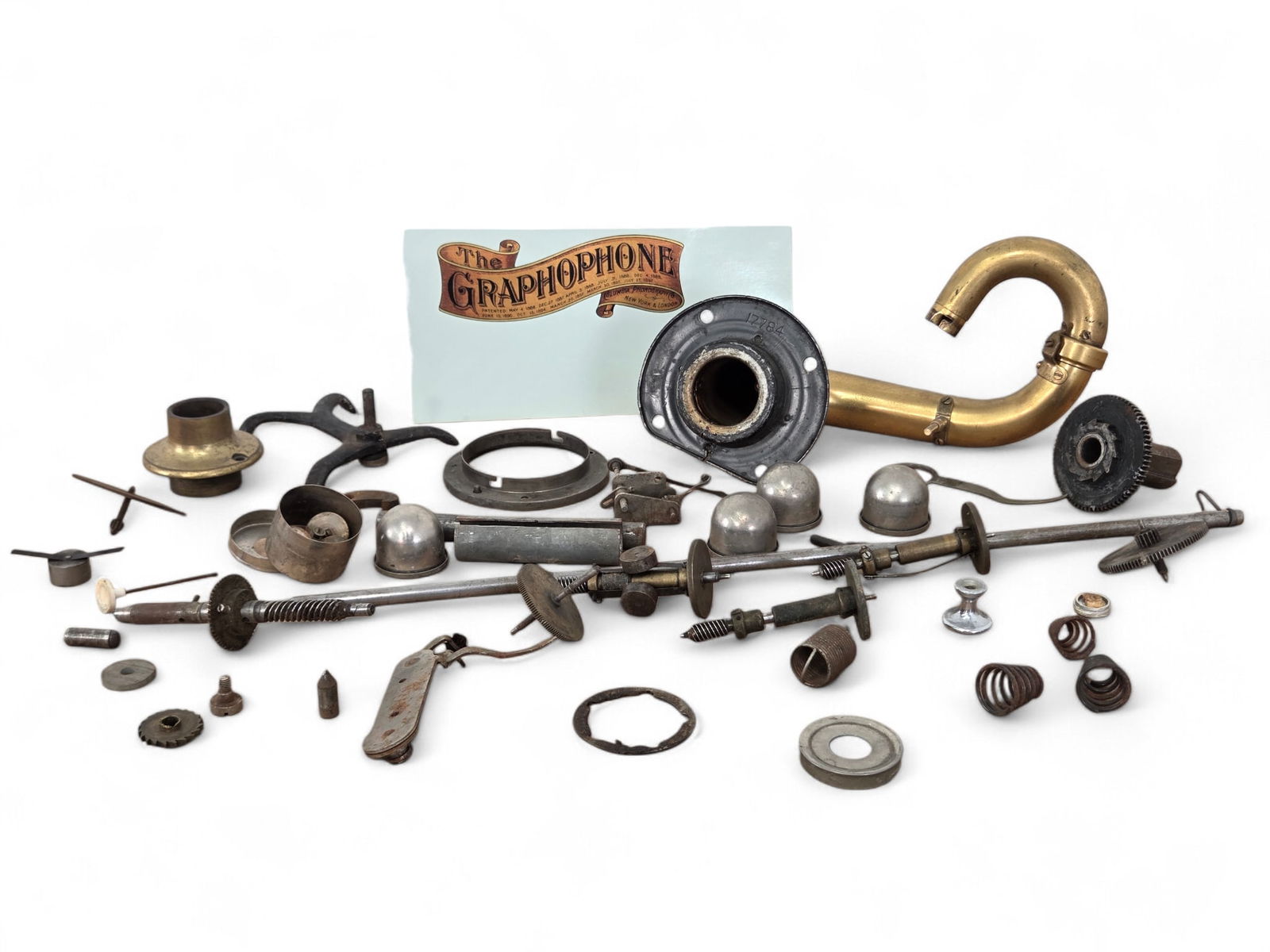 Box Lot of Assorted Antique Phonograph Parts: Grouping of assorted antique phonograph parts and components. The lot includes all items shown in the photos, with most parts appearing to be original examples. <