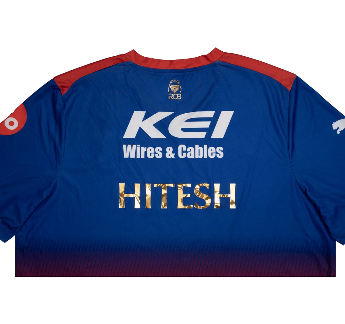 RCB 2024 PUMA FAN EDITION JERSEY WITH TAG SIGNED BY VIRAT KOHLI AND FAB DU PLESSIS - 5