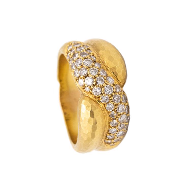 Andrew Grima 18k Gold Ring with 1.50 Ctw in vs Diamonds: A beautiful cross-over piece, crafted in solid 18karats yellow Gold and finished with a delicate battuto hammered pattern.Is pave set with 56 round brilliant cut Diamonds, 1.50 carats, E/F color, VS-2