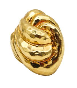 Henry Dunay New York Knots Cocktail Ring In Faceted 18Kt Yellow Gold: Bold cocktail ring, created at the atelier of Henry Dunay in New York city, back in the 1990. This piece was crafted in solid yellow gold of 18 karats with the entire surface finished with the iconic