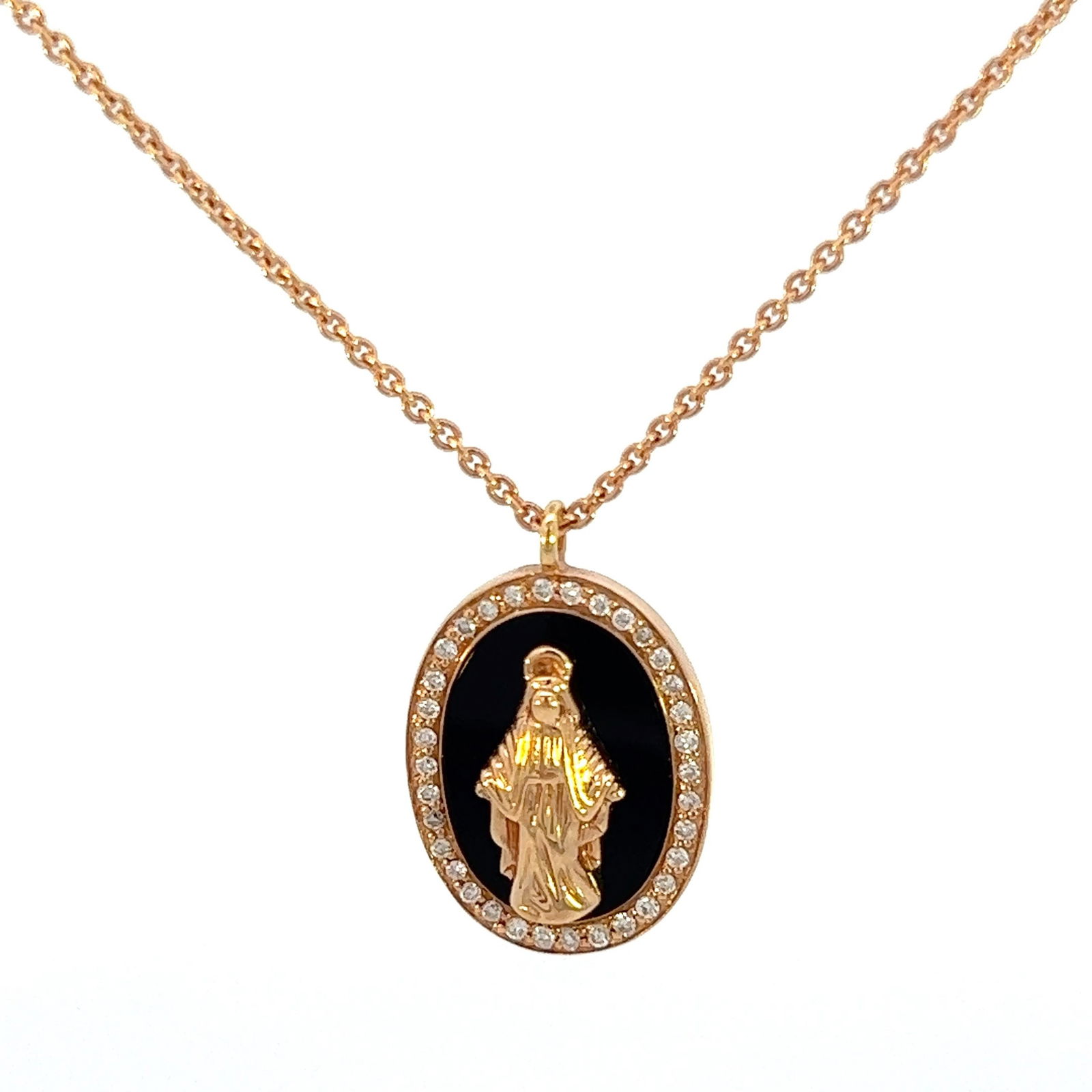 CRIVELLI Madonna Pendant Necklace in 18kt Gold with Onyx and Diamonds: CRIVELLI Madonna Pendant Necklace in 18kt yellow Gold with Onyx and 35 Round cut Diamonds weighing Approx. 0.35 carats. G-H color. Total length: 17.0 inches. Total weight: 4.9 dwt.