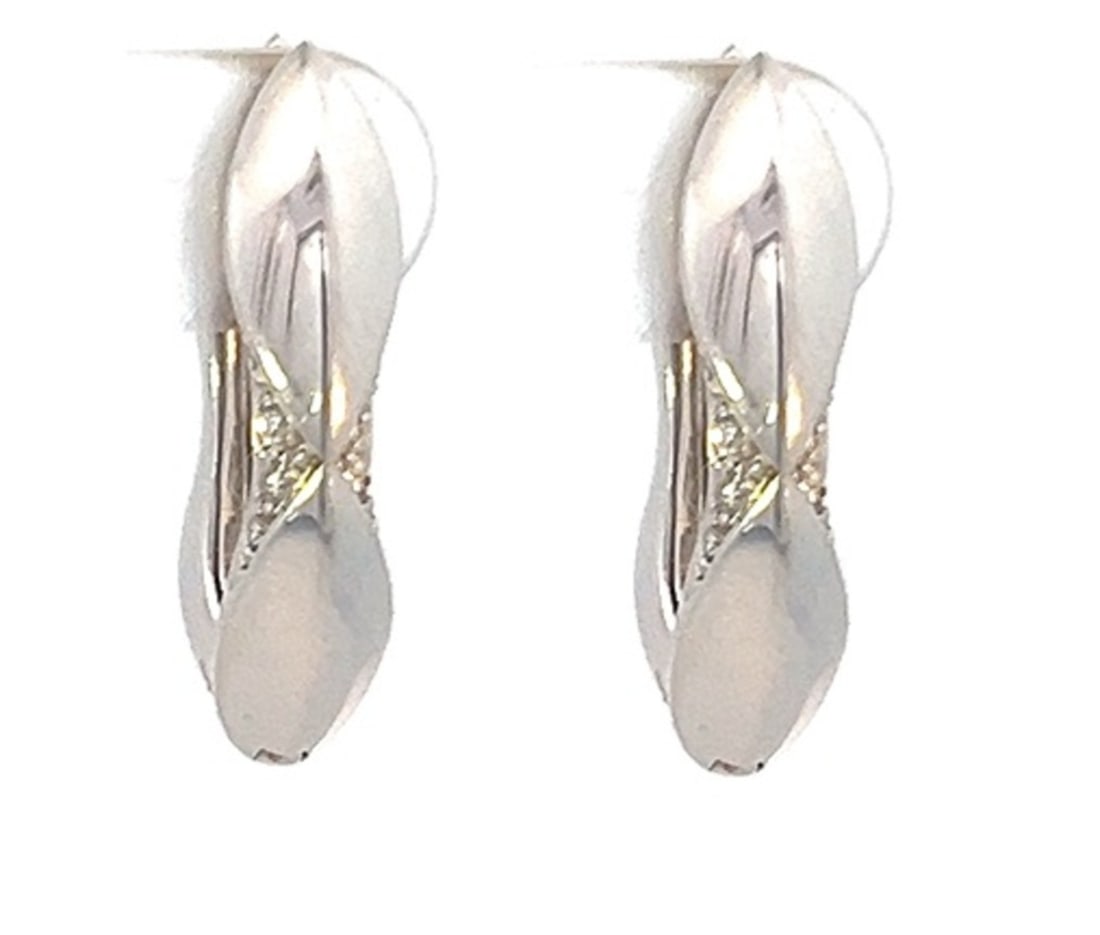 Stephen Webster 18kt Gold Earrings with Diamonds: Pair of 18kt white Gold Earrings by Stephen Webster, featuring 8 Diamonds weighing Approx. 0.15 carats. Graded colorless. Total weight: 5.3 dwt. Measurements: 0.40 x 0.20 inches.