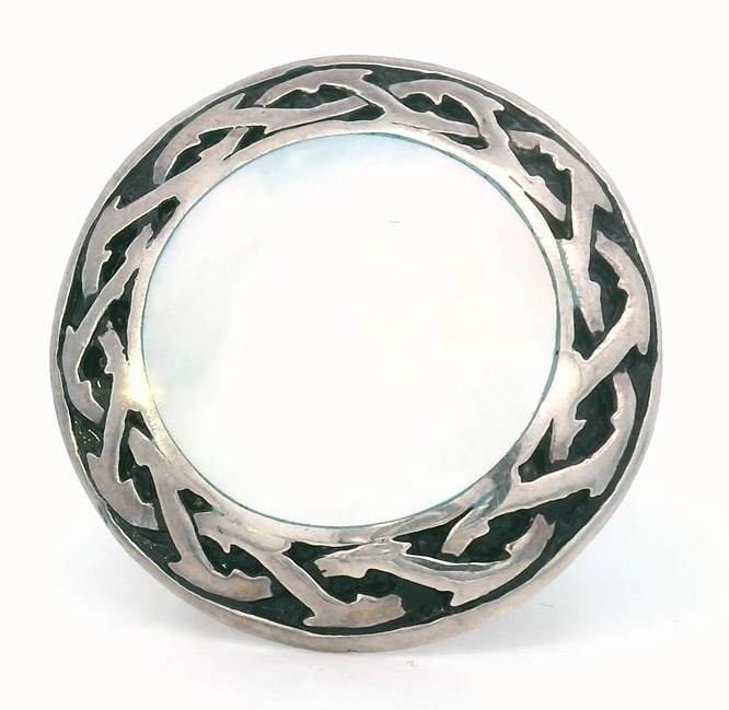 STEPHEN WEBSTER Sterling Silver Ring with Enamel and Mother of Pearl: STEPHEN WEBSTER Sterling Silver Ring featuring a center round piece of Mother of Pearl. Embellished with Black Enamel. Ring size: 7. Total weight: 11.6 dwt.