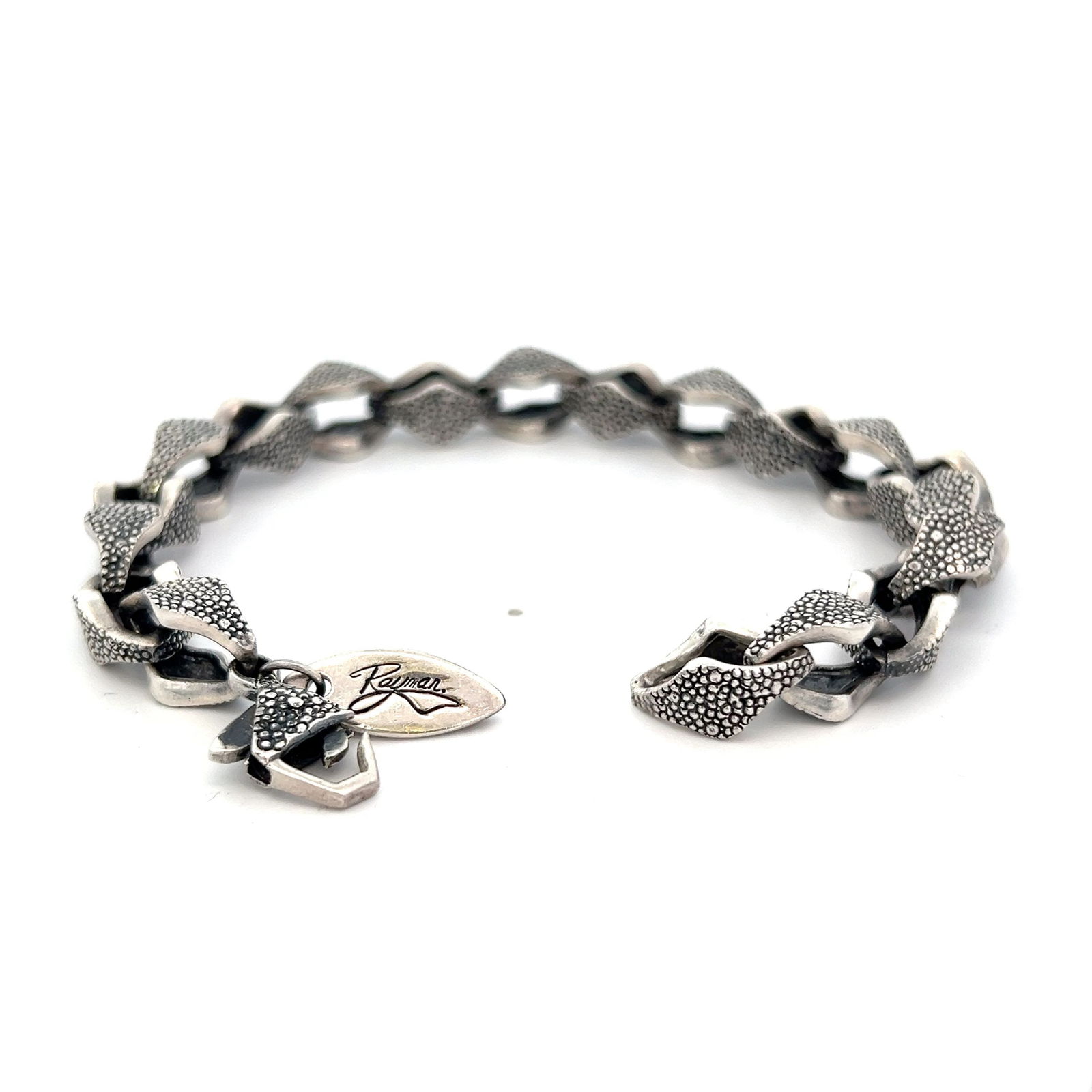 STEPHEN WEBSTER Sterling Silver Textured link Bracelet: STEPHEN WEBSTER Sterling Silver Textured link Bracelet. 7 inches long. Total weight: 27.1 dwt.