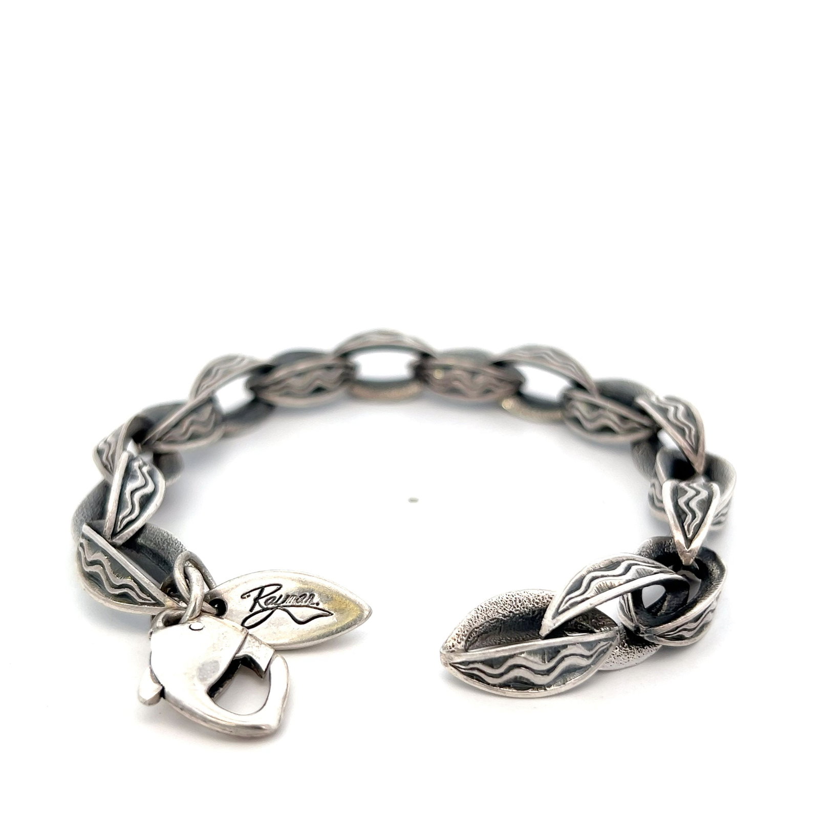 STEPHEN WEBSTER Sterling Silver Textured link Bracelet: STEPHEN WEBSTER Sterling Silver Textured link Bracelet. 7 inches long. Total weight: 31 dwt.