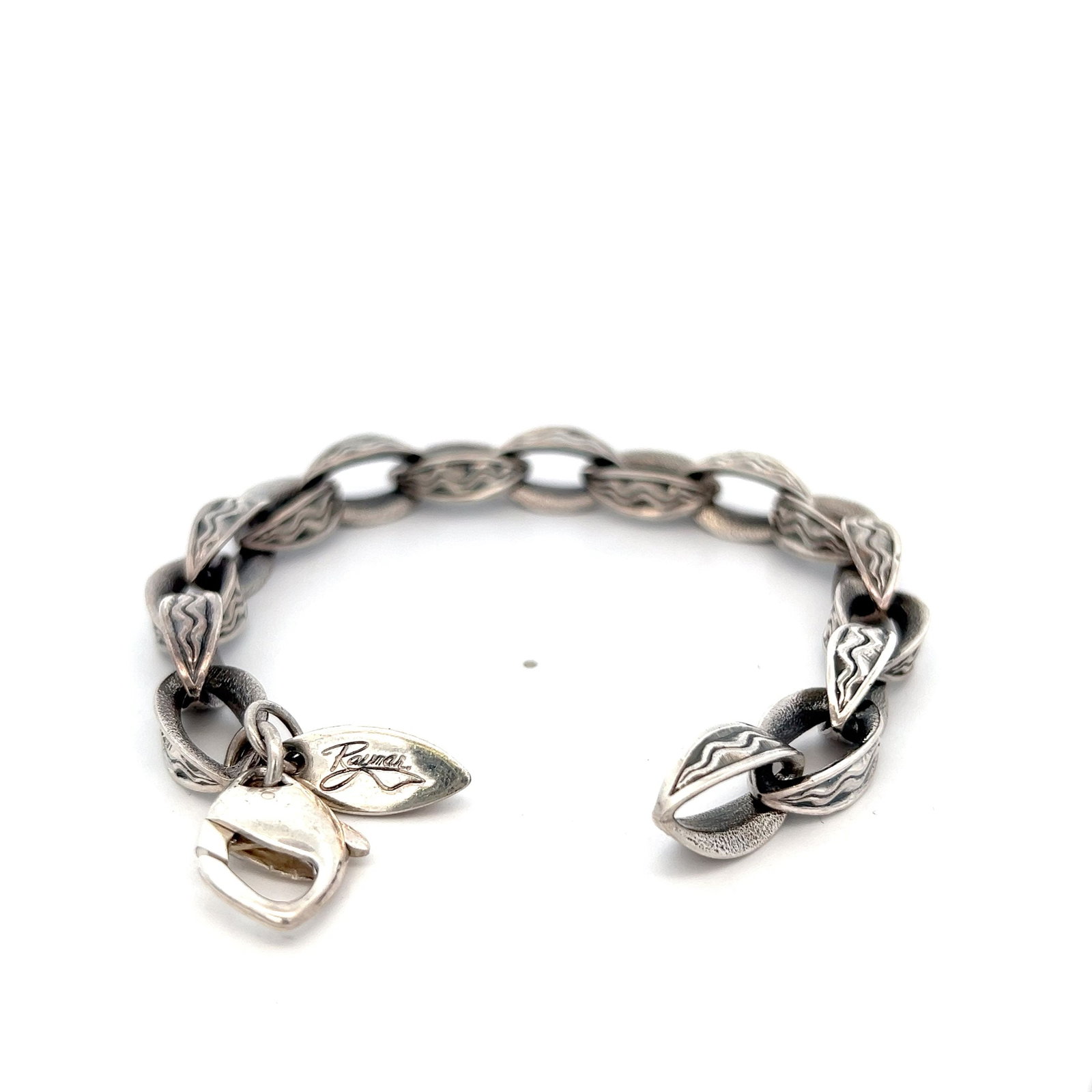 STEPHEN WEBSTER Sterling Silver Textured link Bracelet: STEPHEN WEBSTER Sterling Silver Textured link Bracelet. 7 inches long. Total weight: 30.2 dwt.