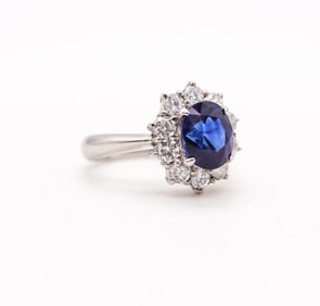 Halo Ring In Platinum With 3.14 Ctw In Sapphires And Diamonds