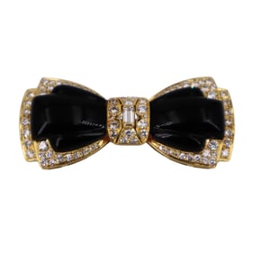 Mid-century 18kt yellow Gold Bow Brooch with Diamonds and Onyx