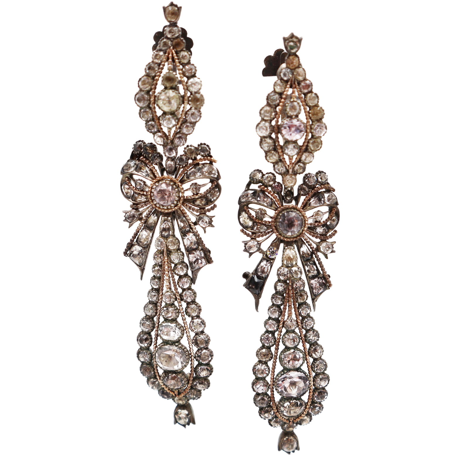 1780s Portuguese Antique Black Dot Paste and Silver Earrings: Fantastic 18th century black dot paste drop Earrings set in silver with a bow motif. These elegant Earrings are rare and desirable, wonderful to wear for evenings on the town. The Earrings measure 3 1