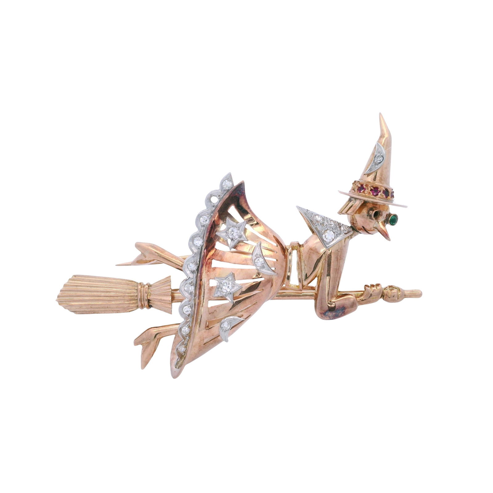 Art Deco Witch Brooch in 18kt Gold and Platinum with Emedald and Diamond: One of a kind Art Deco Witch Brooch crafted in 18kt yellow Gold and Platinum. Embellished with Single cut Diamonds weighing together Approx. 0.20 carats. H color. Along with one Emerald for the eye. T