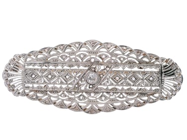 Art Deco Platinum and 18kt Gold filigree Brooch with Diamonds