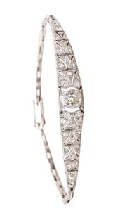EDWARDIAN Bracelet In Platinum With 2.39 Ctw In Diamonds: This is an antique transitional bracelet with diamonds, created during the Edwardian and the art deco periods, back in the 1900. The bracelet has been crafted with impeccable details in solid platinum