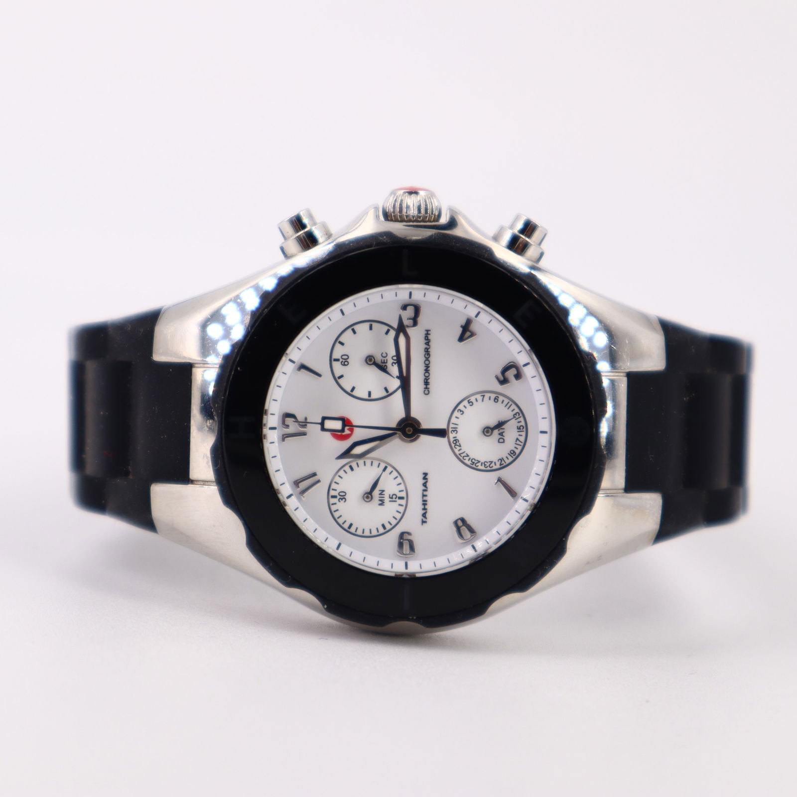 MICHELE Tahitian Jelly Bean Watch: Authentic Michele Jelly Bean Tahitian Women's Watch Model MWW12D000002. Stainless Steel case with Leather strap. Tang Buckle clasp. White dial. Battery Operated Quartz movement. Scratch Resistant Sapp