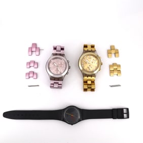 Two SWATCH Irony Diaphane Chrono steel watches, one SWATCH Gent Pinstripe.