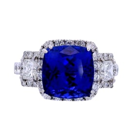 18kt white Gold Halo Ring with 7.90 CTW in Tanzanite and Diamonds