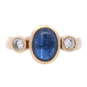 18kt yellow Gold Ring with blue Sapphire and Diamonds