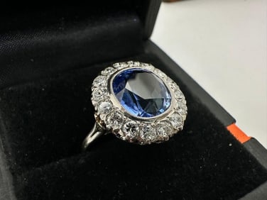 Antique halo Platinum Ring with CEYLON Sapphire of 4.21 Cts and Diamonds