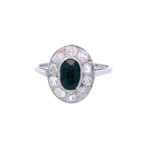 Antique 18kt white Gold Halo Ring with blue Sapphire & Old cut Diamonds