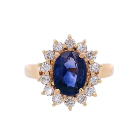 18kt yellow Gold Halo Ring with blue Sapphire & Diamonds