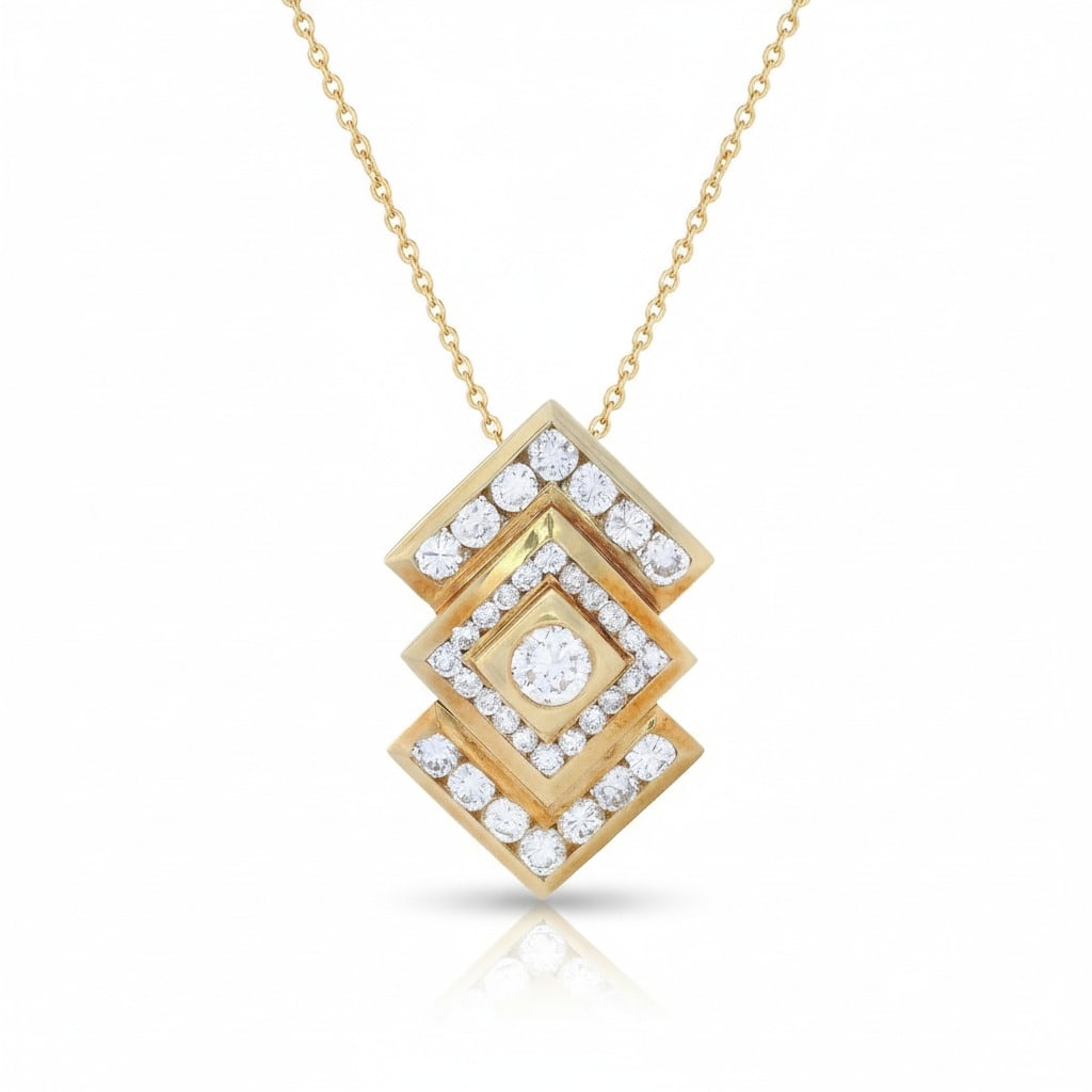 Geometric 18kt yellow Gold Pendant with 1.65 Cts in Diamonds: Geometric Pendant crafted in 18kt yellow Gold, accented with 35 calibrated Round cut Diamonds weighing together Approx. 1.65 carats. H color, VS2-SI1 clarity. Measurements: 1.1 x 0.7 inches. Total wei