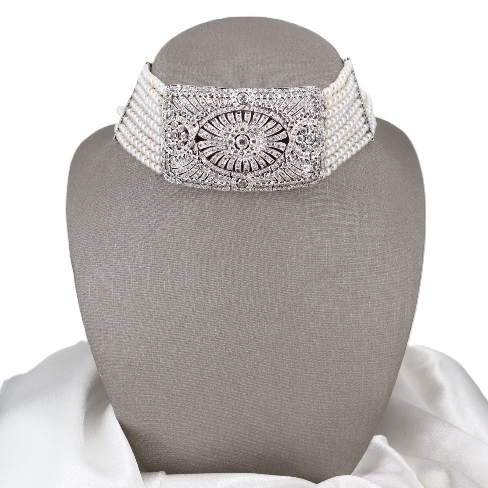 Vintage 18kt white Gold Choker Necklace with Pearls & 10.0 CTS in Diamonds: Exquisite vintage multistrand pearl choker necklace crafted in 18kt white gold, highlighted by a central platinum filigree panel adorned with old mine and full-cut diamonds totaling approximately 10.0