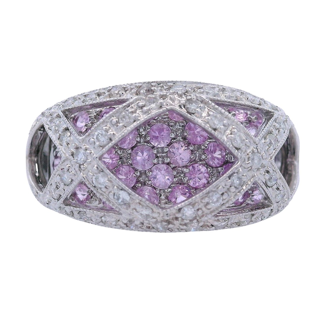 14kt white Gold Cocktail Ring with Pink Sapphires & Diamonds: Contemporary Ring crafted from 14kt white Gold, accented with 40 Round cut Pink Sapphires weighing together Approx. 1.02 Carats. Along with Round cut Diamonds weighing together Approx. 0.30 carats. J-