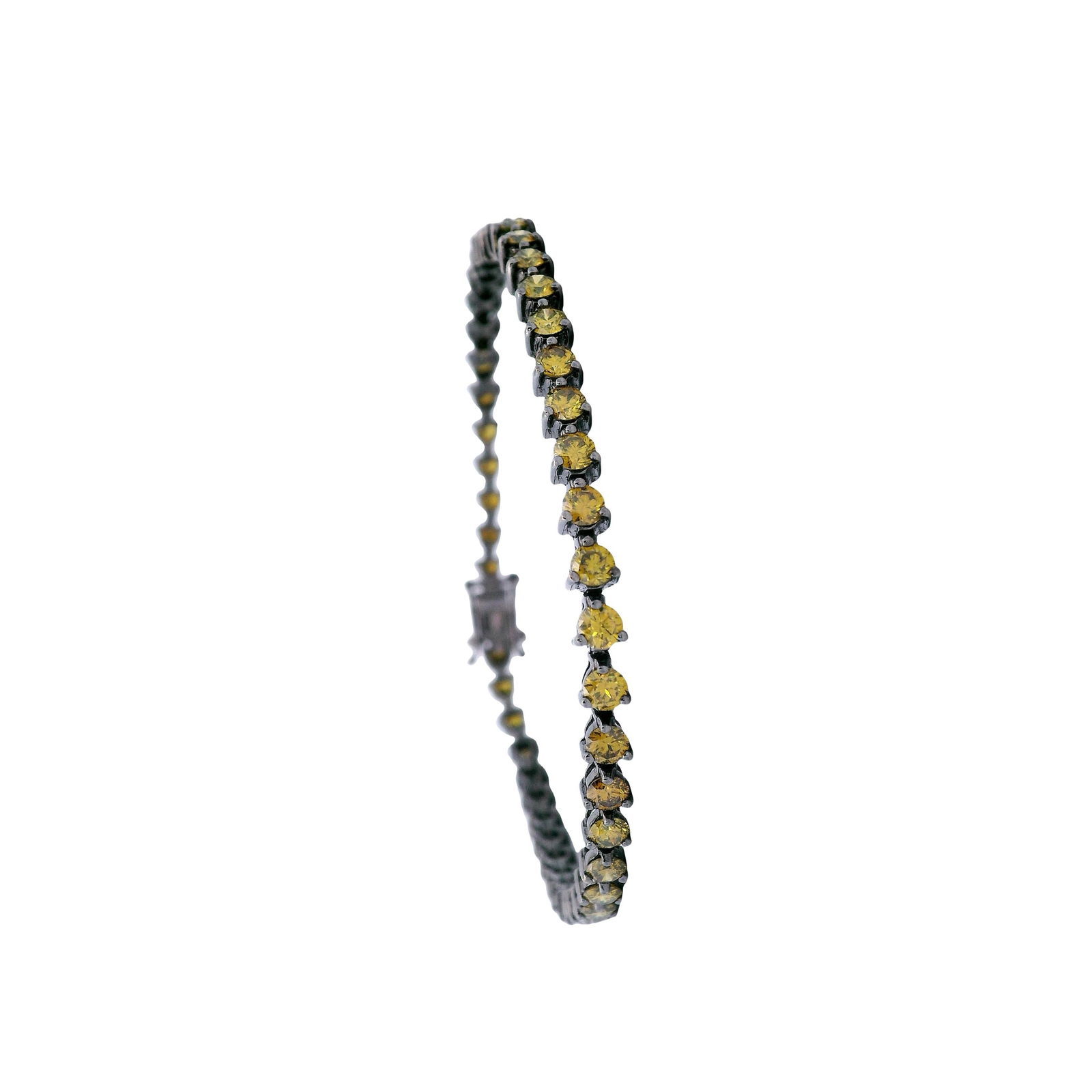 18kt Gold Tennis Bracelet with yellow Diamonds: 18kt Gold Tennis Bracelet with black Rhodium, Accented with Round cut yellow Diamonds weighing together Approx. 3.00 carats . Total weight: 8.20 grams