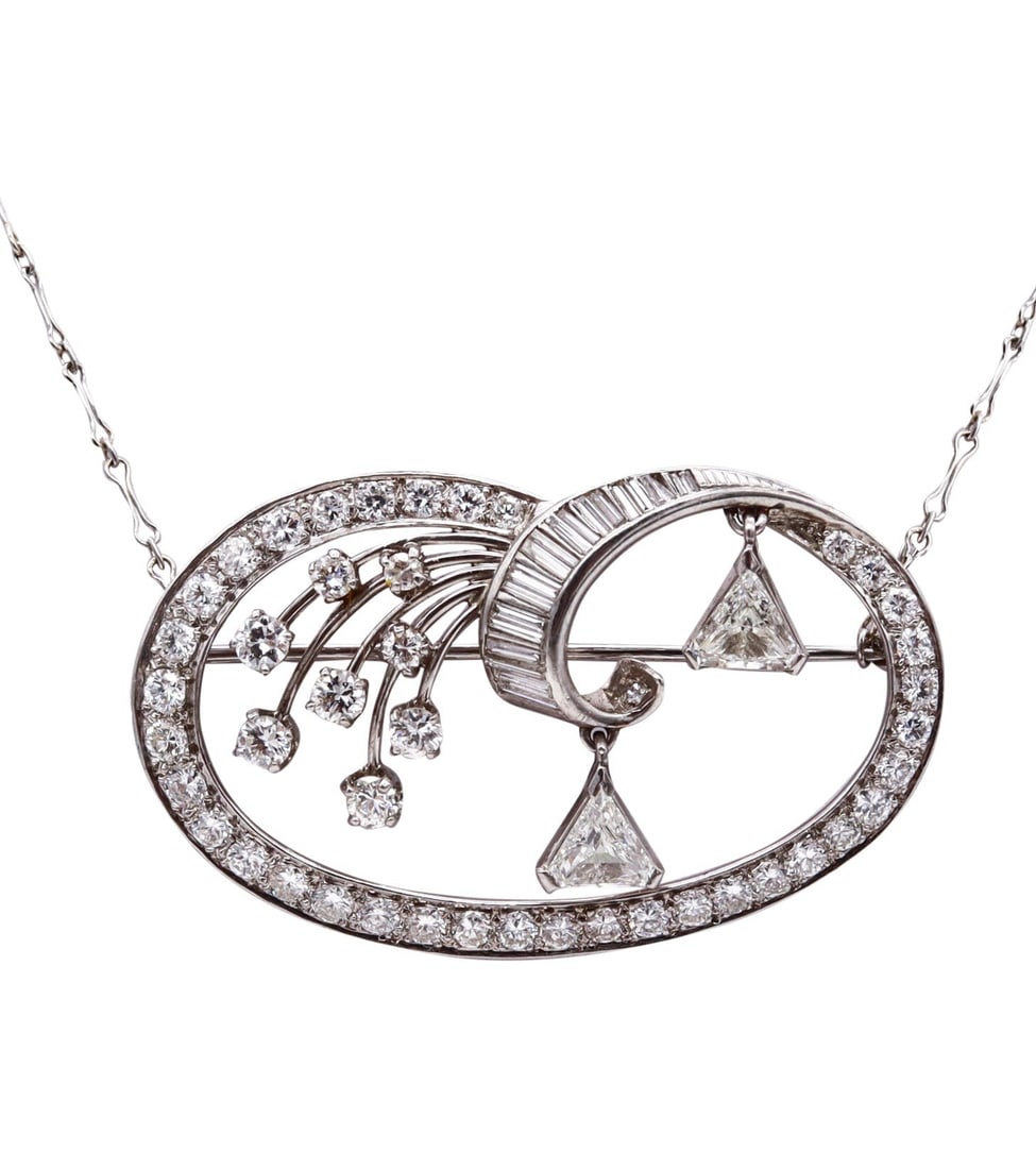 Art Deco 1930 Platinum Convertible Pendant Brooch With 5.02 Cts In Diamonds Calf Cut: A beautiful, delicate American Art Deco jewel from the 1930s, designed as a versatile convertible necklace-to-brooch and expertly crafted in .900 platinum with .100 iridium. The piece is accompanied b